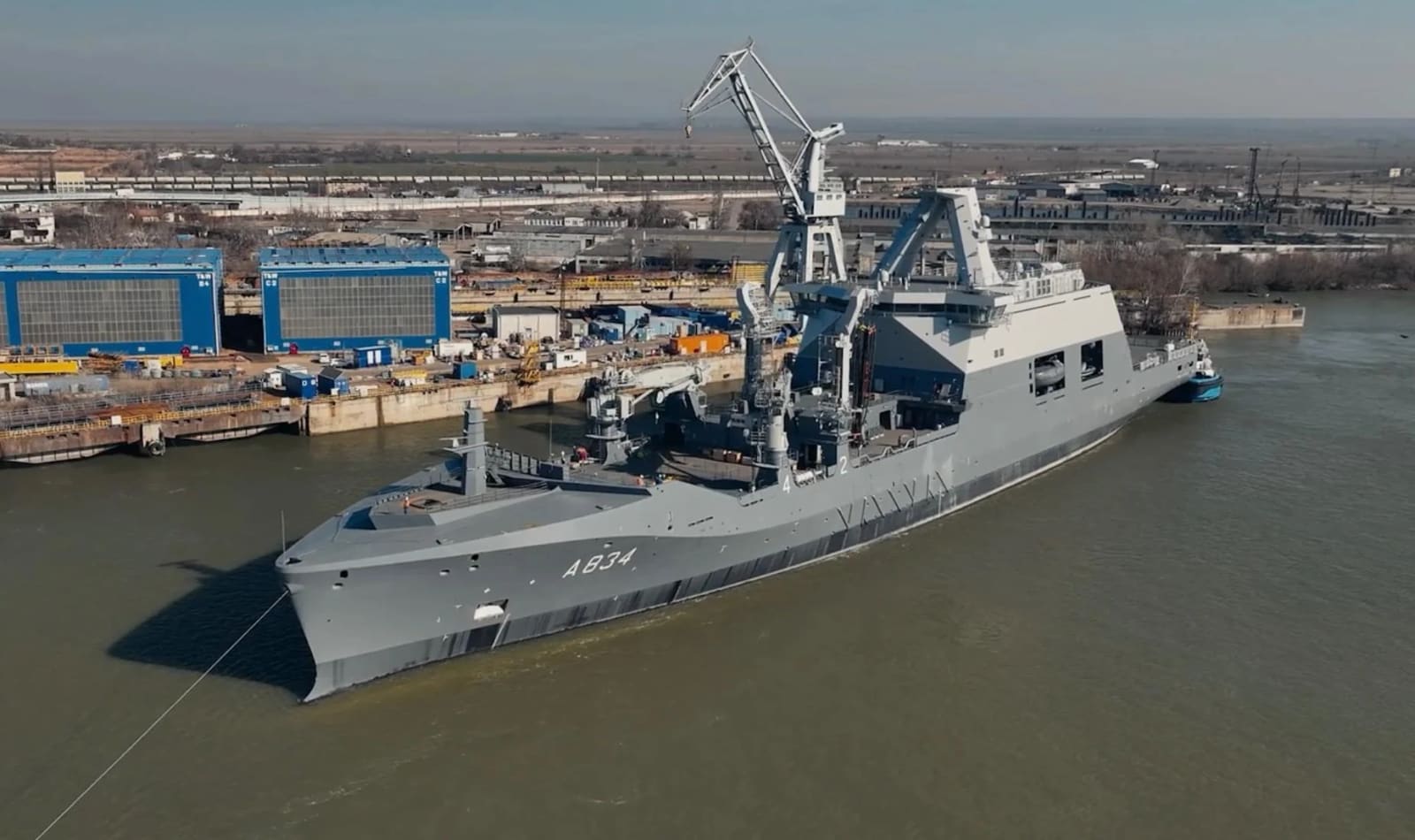 Royal Netherlands Navy Combat Support Ship Den Helder (A834) at Damen Shipyards Galați, grey naval hull with replenishment-at-sea masts.