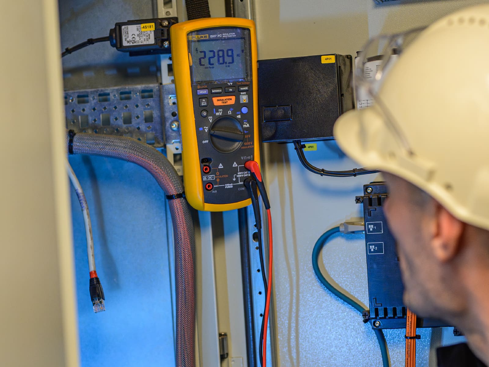 Cold wire testing with a multimeter or insulation tester on marine cables before activation.